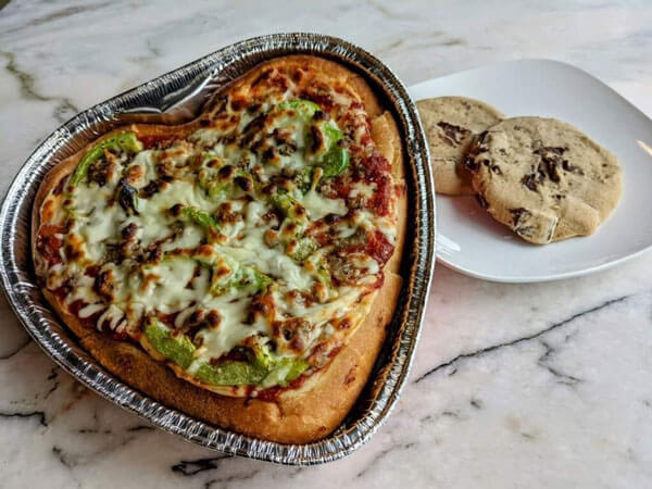 A heart-shaped pizza.