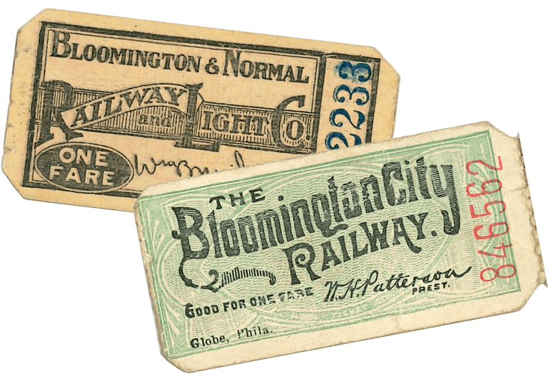 Two vintage transit tickets, one beige and one pale green, overlapping at an angle.