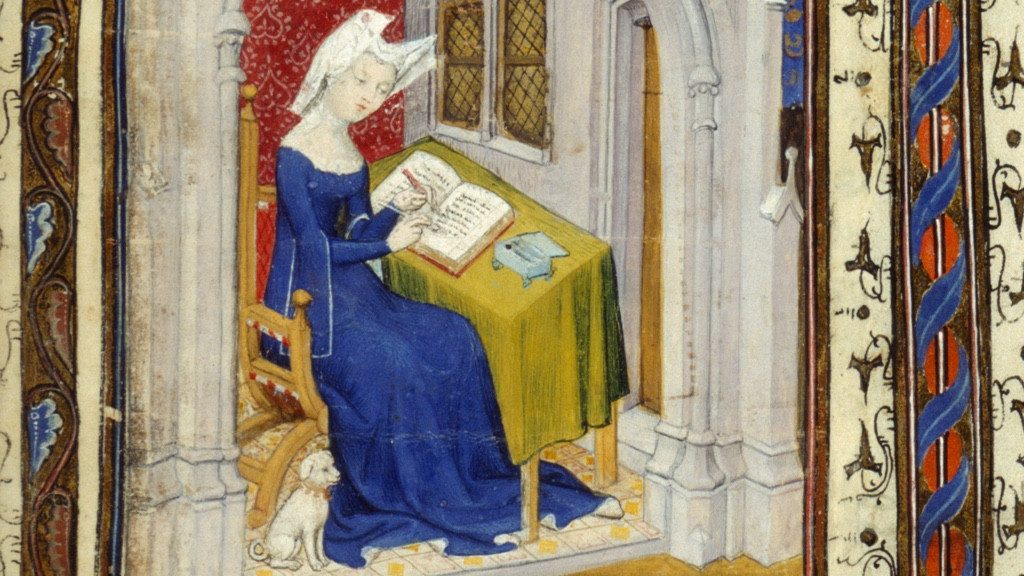 Medieval woman writing in a book