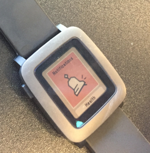 a pebble time watch. there is a bell icon and the text says Notifications