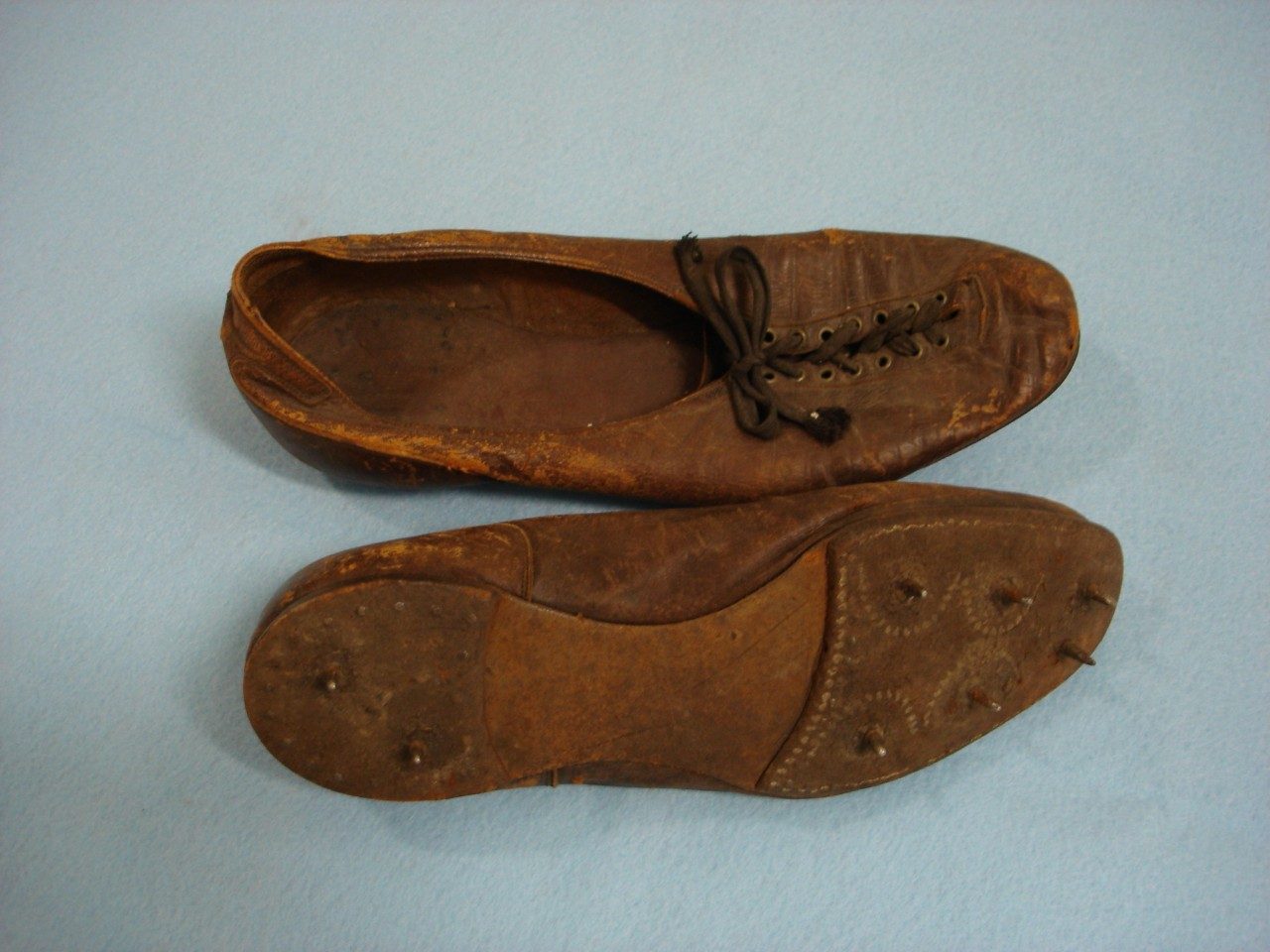 Track Shoes Worn by Eugene Schmitt, Columbia University Track Athlete, 1914-1915 (University Museum photo, click on image to enlarge)