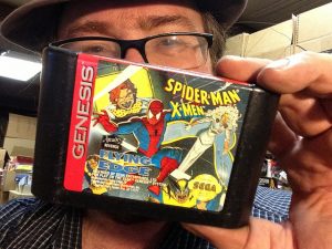 In this photo he is holding Spider-Man XMen for Genesis